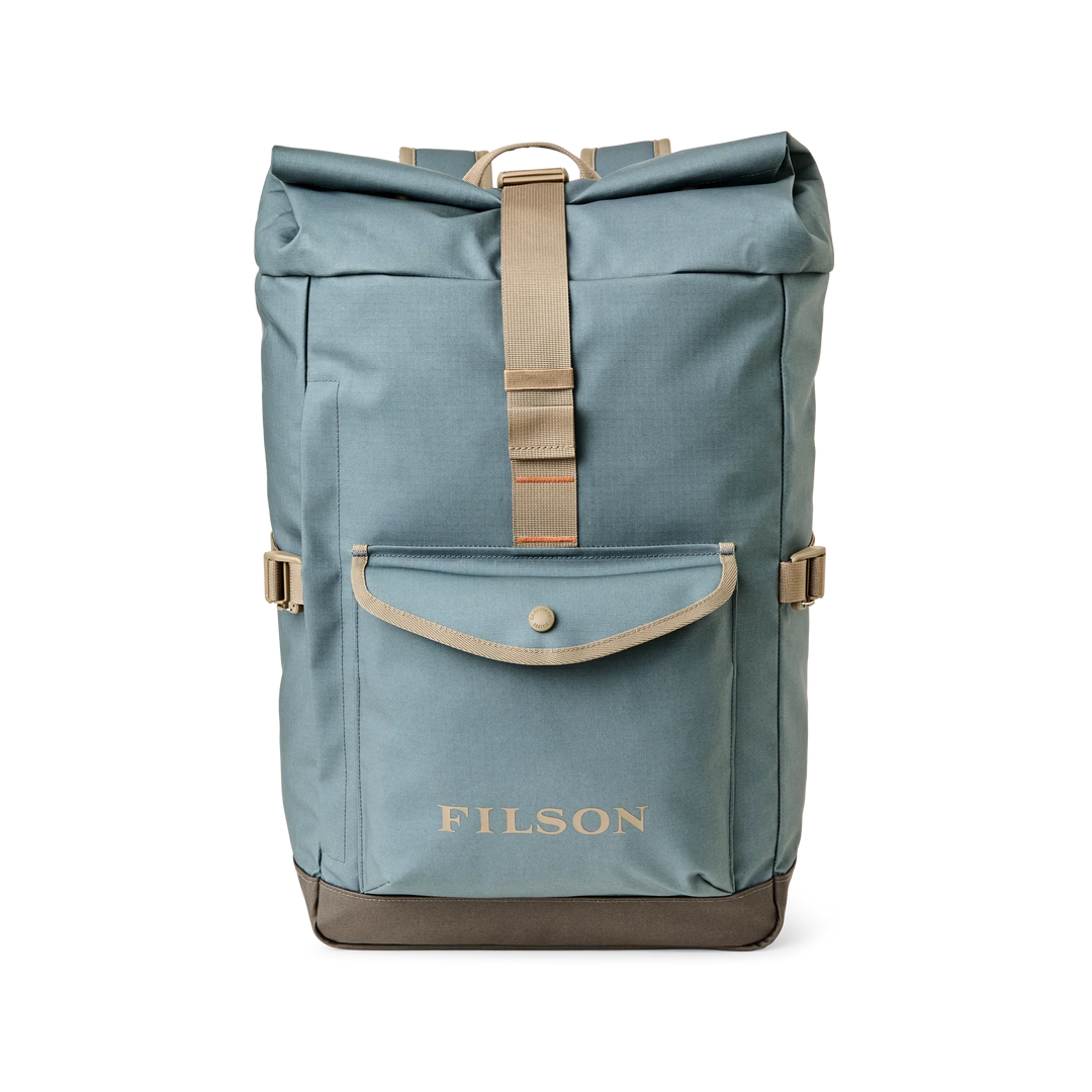 Filson Scout Backpack in blue recycled fabric with zippered compartments, side pockets, and padded straps.