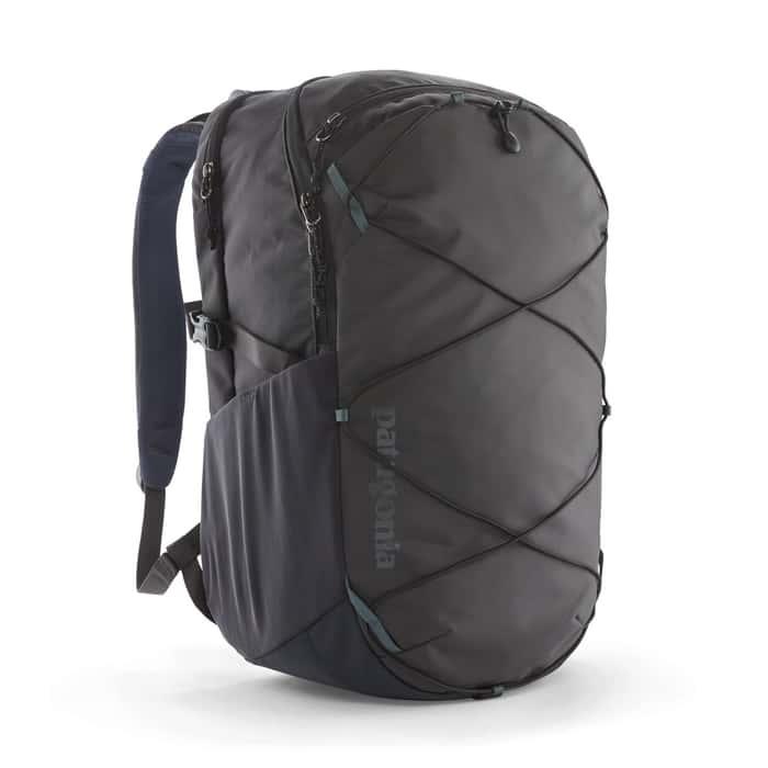 Patagonia Refugio 30L Daypack in black with multiple zippered compartments, side water bottle pockets, and padded shoulder straps.