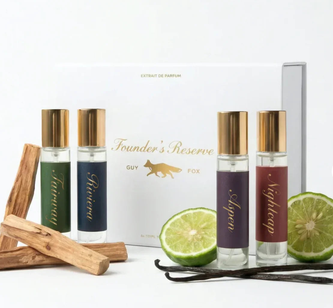 Guy Fox Unisex Perfume Travel Set Signature Scent On the Go- Four perfume bottles with gold caps.