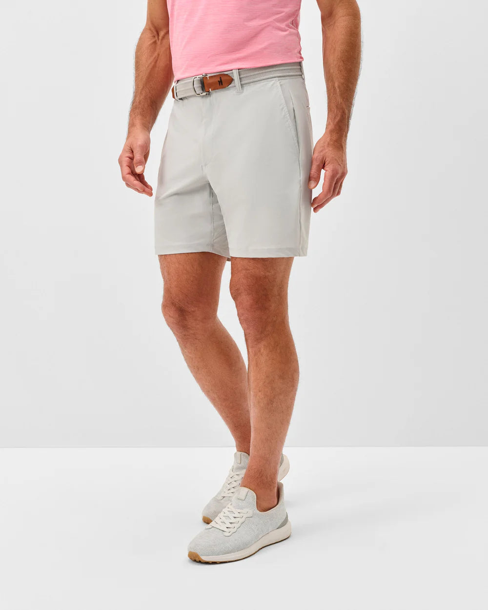 Man wearing Johnnie-O Men Fusion Knit 9 Performance Pull-On Short-Light Gray
