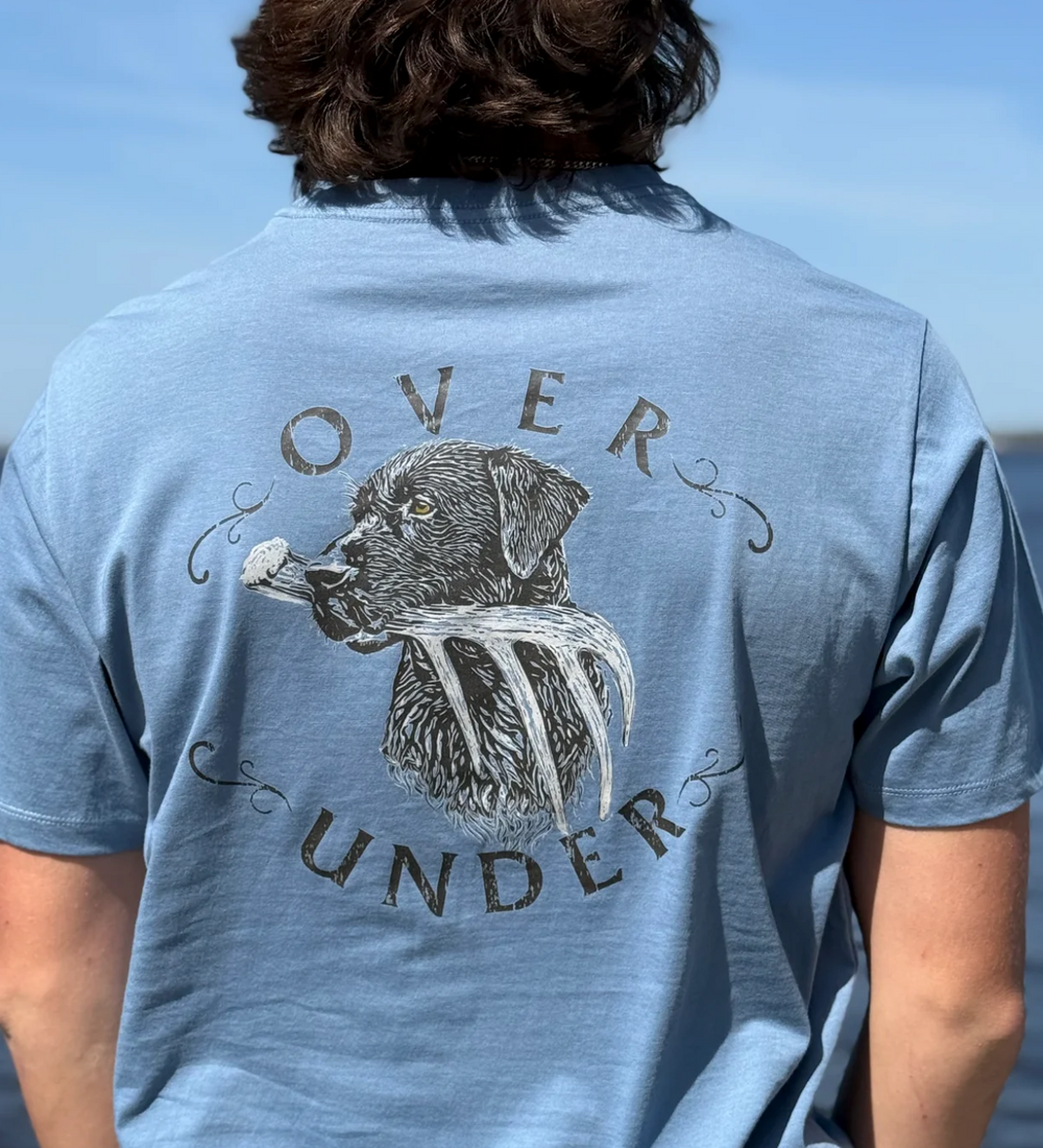 Man wearing Over Under Unisex Shed Hunter Comfort T-shirt- Blue Back View
