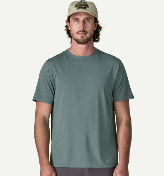 Man wearing Patagonia Men's Capilene® Ultra Lightweight Shirt-Teal