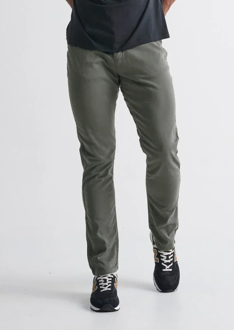 Person wearing DUER No Sweat Performance Comfort Pants 