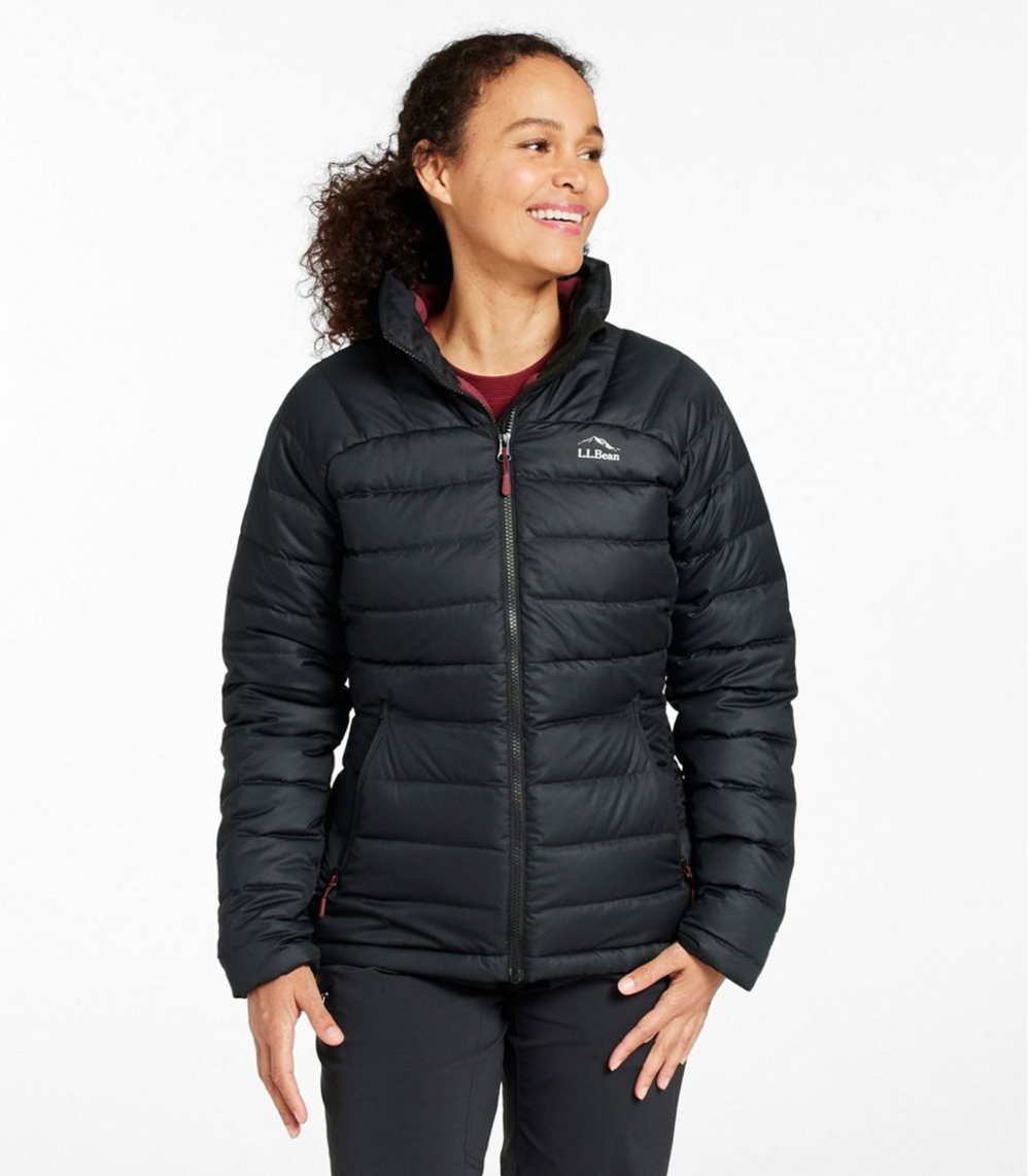 Woman wearing LL Bean Women’s Down Jacket outdoors, showcasing lightweight warmth, water‑resistant shell, and versatile everyday style.