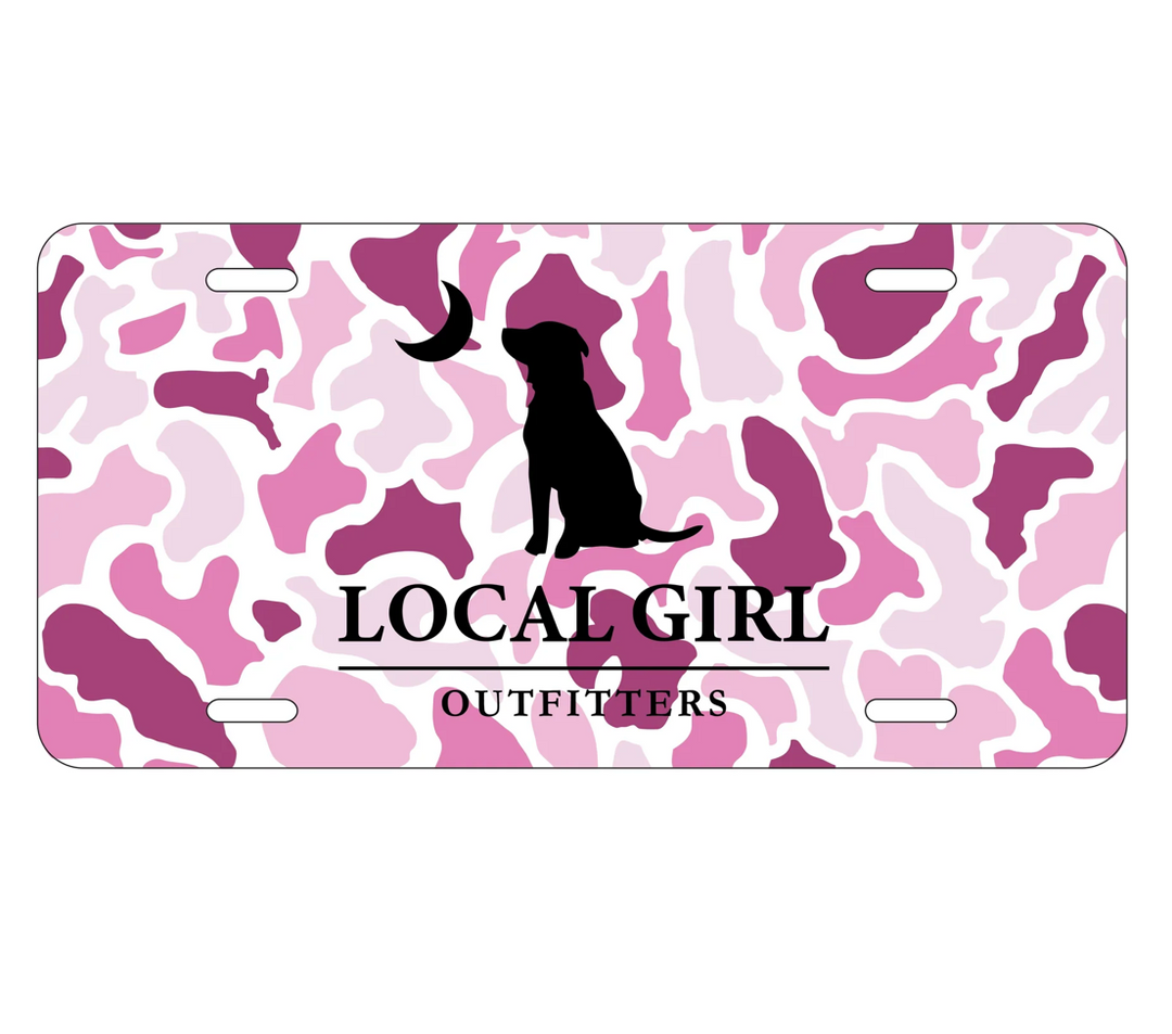 Pink camouflage license plate with black dog silhouette and 'LOCAL GIRL OUTFITTERS' logo