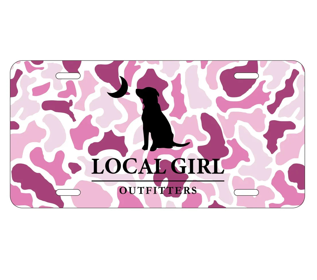 Pink camouflage license plate with black dog silhouette and 'LOCAL GIRL OUTFITTERS' logo