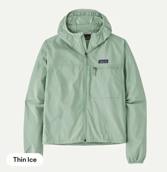 Patagonia Women’s Light Variable® Jacket in navy with zip‑front closure, lightweight recycled fabric, and adjustable hood.