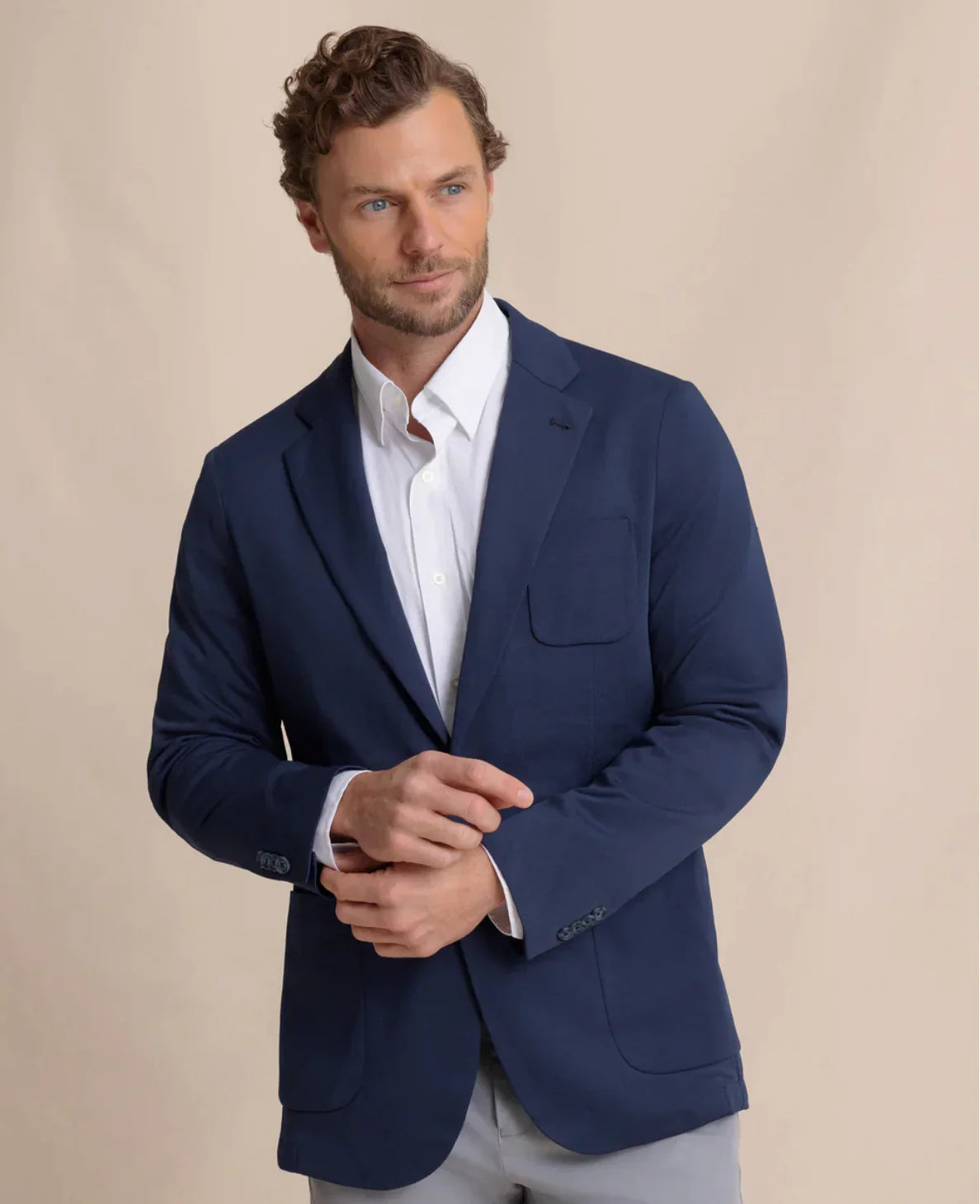 a man wearing Southern Tide Charleston Blazer Formalwear-Navy 